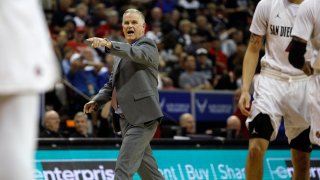 LAS VEGAS, NEVADA – MARCH 07: Head coach Brian Dutcher of the San Diego State Aztecs coaches his team against the Utah State Aggies during the championship game of the Mountain West Conference basketball tournament at the Thomas & Mack Center on March 7, 2020 in Las Vegas, Nevada. (Photo by Joe Buglewicz/Getty Images)
