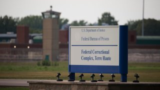 File photo: View of a sign outside the Terre Haute Federal Correctional Complex in Indiana.
