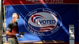 A voter walks into the the San Diego County Registrar of Voters to cast his ballot