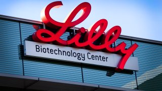 Eli Lilly & Co. signage is displayed outside the company's office in La Jolla, California, U.S., on Tuesday, Aug. 23, 2011.