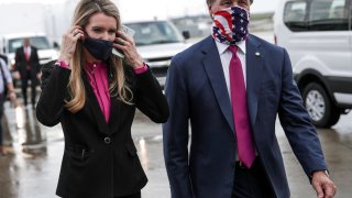 Senators Kelly Loeffler, R-Ga., and David Perdue, R-Ga., at Hartsfield-Jackson Atlanta International Airport on July 15, 2020.