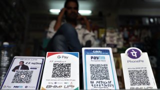Paytm, PhonePe, Google Pay (Gpay) and Bhim UPI QR Codes (Standee) are Kept outside for Cashless payments at a medical store in Gurugram on the outskirts of New Delhi, India on 16 May 2020.