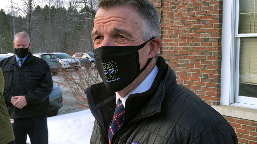 Vermont Republican Gov. Phil Scott speaks to reporters after voting on Tuesday, Nov. 3, 2020, in his hometown of Berlin, Vt. Scott said he voted for Democrat Joe Biden for president because he believes the former vice president can do more to bring the country together. He said it was the first time in his life he's voted for a Democrat.