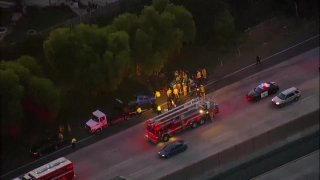 SkyRanger 7 is over the freeway involving an SDPD officer