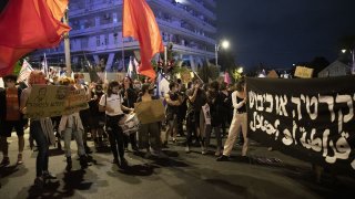 Israeli protestors gather on Saturday night in protest against Prime Minister Benjamin Netanyahu demanding his resignation over corruption cases and his failure to combat the new type of coronavirus (Covid-19) pandemic in West Jerusalem on October 31, 2020.