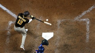 ARLINGTON, TEXAS – OCTOBER 07: Manny Machado #13 of the San Diego Padres at bat against the Los Angeles Dodgers in Game Two of the National League Division Series at Globe Life Field on October 07, 2020 in Arlington, Texas. (Photo by Tom Pennington/Getty Images)