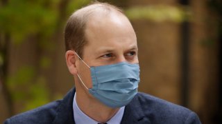 In this Oct. 20, 2020, file photo, Britain’s Prince William wears a face covering to curb the spread of coronavirus.