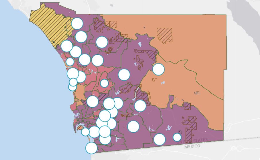 A map showing colored case rate tiers for each city in San Diego County.