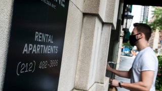 A man enters a building with rental apartments available on August 19, 2020 in New York City.