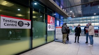 A view of signage leading to one of the testing centers at Heathrow Airport on December 22, 2020 in London, England.