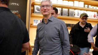 NEW YORK, NEW YORK – SEPTEMBER 20: Apple CEO Tim Cook greets customers at the grand reopening of Apple’s flagship Apple Fifth Avenue retail store on September 20, 2019 in New York City.