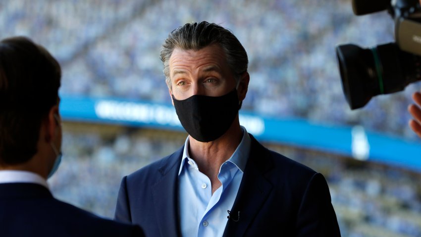 File Image: Los Angeles, California Oct. 30, 2020 Gov. Gavin Newsom talks to the media after visiting Dodger Stadium on Oct. 30, 2020. (Carolyn Cole/ Los Angeles Times via Getty Images)