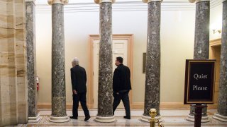 Senate Majority Leader Mitch McConnell (R-KY) heads towards his office from the Senate Floor at the U.S. Capitol on January 1, 2021 in Washington, DC. The Senate voted to pass the National Defense Authorization Act and override President Trump's veto for the first time during his presidency.