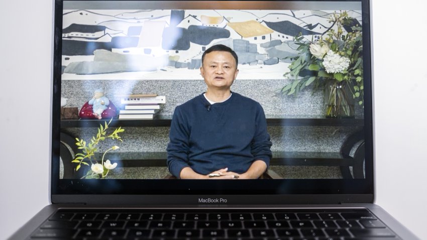 A video recording of a livestream of Jack Ma, co-founder of Alibaba Group Holding Ltd., addressing teachers at an annual event he hosts to recognize rural educators, on a laptop computer arranged in Hong Kong, China, on Wednesday, Jan. 20, 2021. Ma has resurfaced after months out of public view that fueled intense speculation about the plight of the billionaire grappling with escalating scrutiny over his internet empire.