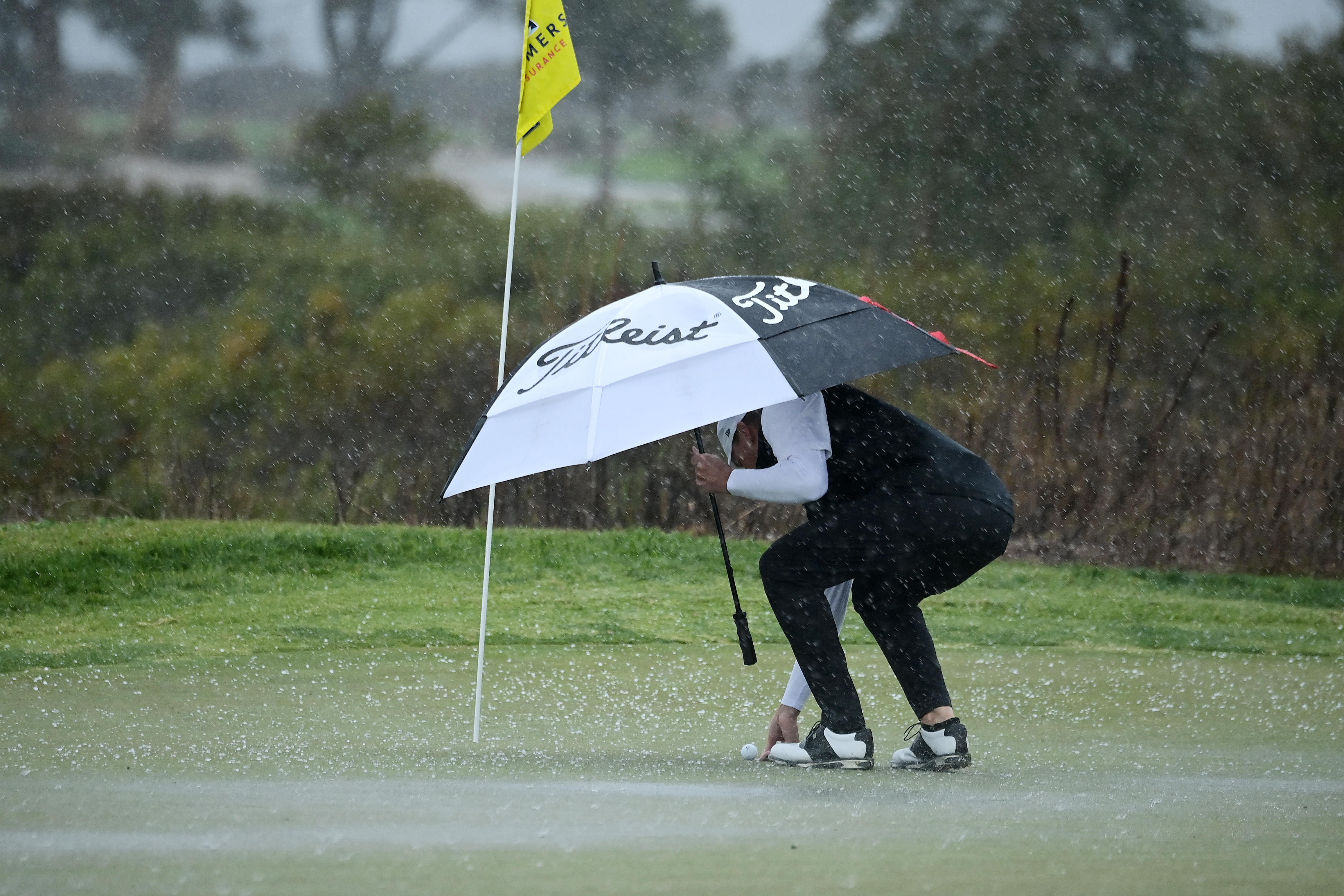 Pros Play Through Wind, Rain and Hail During Round 2 of 2021 Farmers Insurance Open