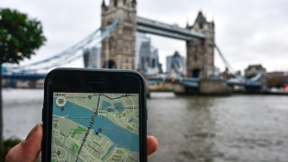 A person using the Uber app in London.