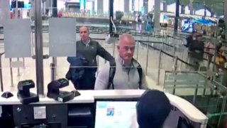 This Dec. 30, 2019, file image from security camera video shows Michael L. Taylor, center, and George-Antoine Zayek at passport control at Istanbul Airport in Turkey. An American father and son have been extradited to Japan and charged for smuggling former Nissan Motor Co. Chairman Carlos Ghosn out of the country while he was awaiting trial.