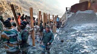 Indo Tibetan Border Police (ITBP) personnel undertake rescue work at one of the hydro power project at Reni village in Chamoli district, in Indian state of Uttrakhund, Monday, Feb.8, 2021. Rescue efforts continued on Monday to save 37 people after part of a glacier broke off, releasing a torrent of water and debris that slammed into two hydroelectric plants on Sunday.