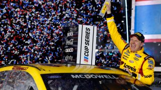 Michael McDowell, driver of the #34 Love's Travel Stops Ford, celebrates in victory lane after winning the NASCAR Cup Series 63rd Annual Daytona 500 at Daytona International Speedway on February 14, 2021 in Daytona Beach, Florida.
