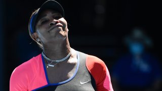 United States' Serena Williams reacts during her semifinal against Japan's Naomi Osaka at the Australian Open tennis championship in Melbourne, Australia, Thursday, Feb. 18, 2021.