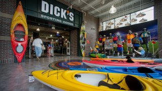 Kayaks are displayed outside of a Dick’s Sporting Goods Inc. store in West Nyack, New York.