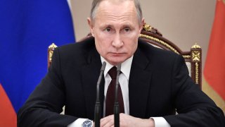 Russian President Vladimir Putin chairs a meeting with members of the government in Moscow, Russia, on Feb. 5, 2020.