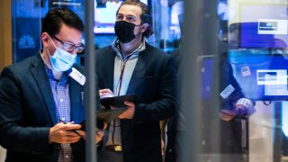 Traders on the floor of the New York Stock Exchange.