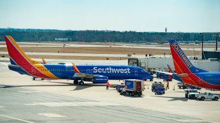 A Boeing 737 flown by Southwest Airlines taxis to the gate at Baltimore Washington International Airport near Baltimore, Maryland, on March 13, 2019.