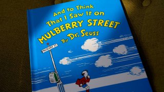 A copy of the book "And to Think That I Saw It on Mulberry Street," by Dr. Seuss, March 1, 2021, in Walpole, Massachusetts. Dr. Seuss Enterprises, the business that preserves and protects the author and illustrator's legacy, announced on his birthday, March 2, 2021, that it would cease publication of several children's titles including "And to Think That I Saw It on Mulberry Street" and "If I Ran the Zoo," because of insensitive and racist imagery.