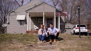 Logan DeWitt with his wife Mckenzie and daughter Elizabeth