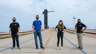 Jared Isaacman, from left to right, Hayley Arceneaux, Sian Proctor and Chris Sembroski pose for a photo