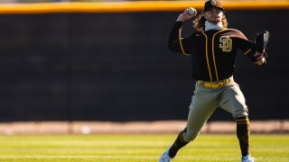 PEORIA, AZ – FEBRUARY 18: Pitcher Chris Paddack #59 of the San Diego warms up in the outfield on February 18, 2021 in Peoria, Arizona. (Photo by Matt Thomas/San Diego Padres/Getty Images)