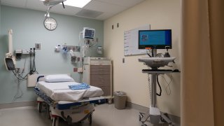 An empty bed in a room at the emergency department of Sharp Memorial Hospital in San Diego