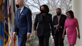 (from L) US President Joe Biden, US Vice President Kamala Harris, US Senate Majority Leader Chuck Schumer, Democrat of New York, and House Speaker Nancy Pelosi, Democrat of California, arrive for an event on the American Rescue Plan in the Rose Garden of the White House in Washington, DC, on March 12, 2021.