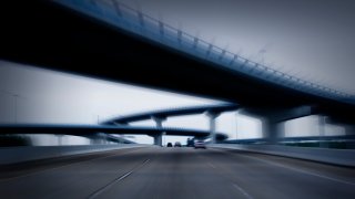 File image of a blurry view of a highway.