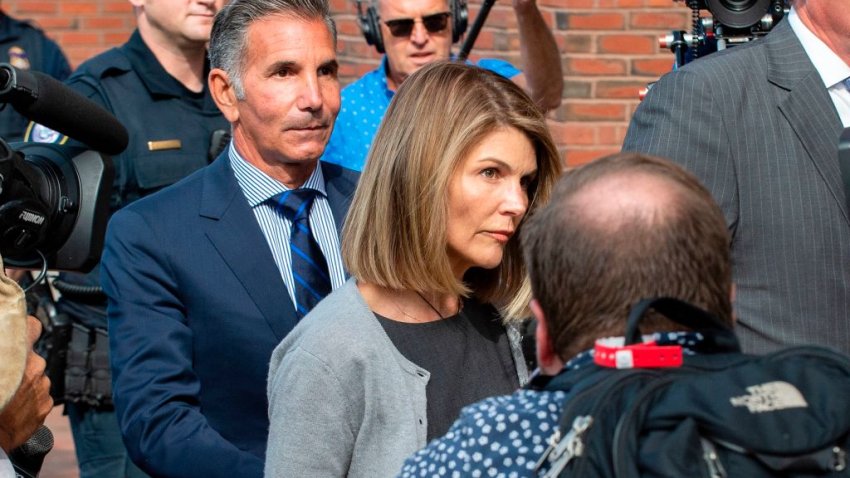 File Image: Actress Lori Loughlin and husband Mossimo Giannulli exit the Boston Federal Court house after a pre-trial hearing with Magistrate Judge Kelley at the John Joseph Moakley US Courthouse in Boston on August 27, 2019. – Loughlin and Giannulli are charged with conspiracy to commit mail and wire fraud and conspiracy to commit money laundering in the college admissions scandal. (Photo by Joseph Prezioso / AFP)        (Photo credit should read JOSEPH PREZIOSO/AFP via Getty Images)