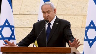 Israeli Prime Minister Benjamin Netanyahu speaks during a ceremony to mark Yom HaZikaron, Israel's Memorial Day for fallen soldiers, at the Yad LeBanim House in Jerusalem on April 13, 2021.