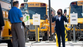 US Vice President Kamala Harris speaks as she tours the Thomas Built Buses factory in High Point, North Carolina, April 19, 2021