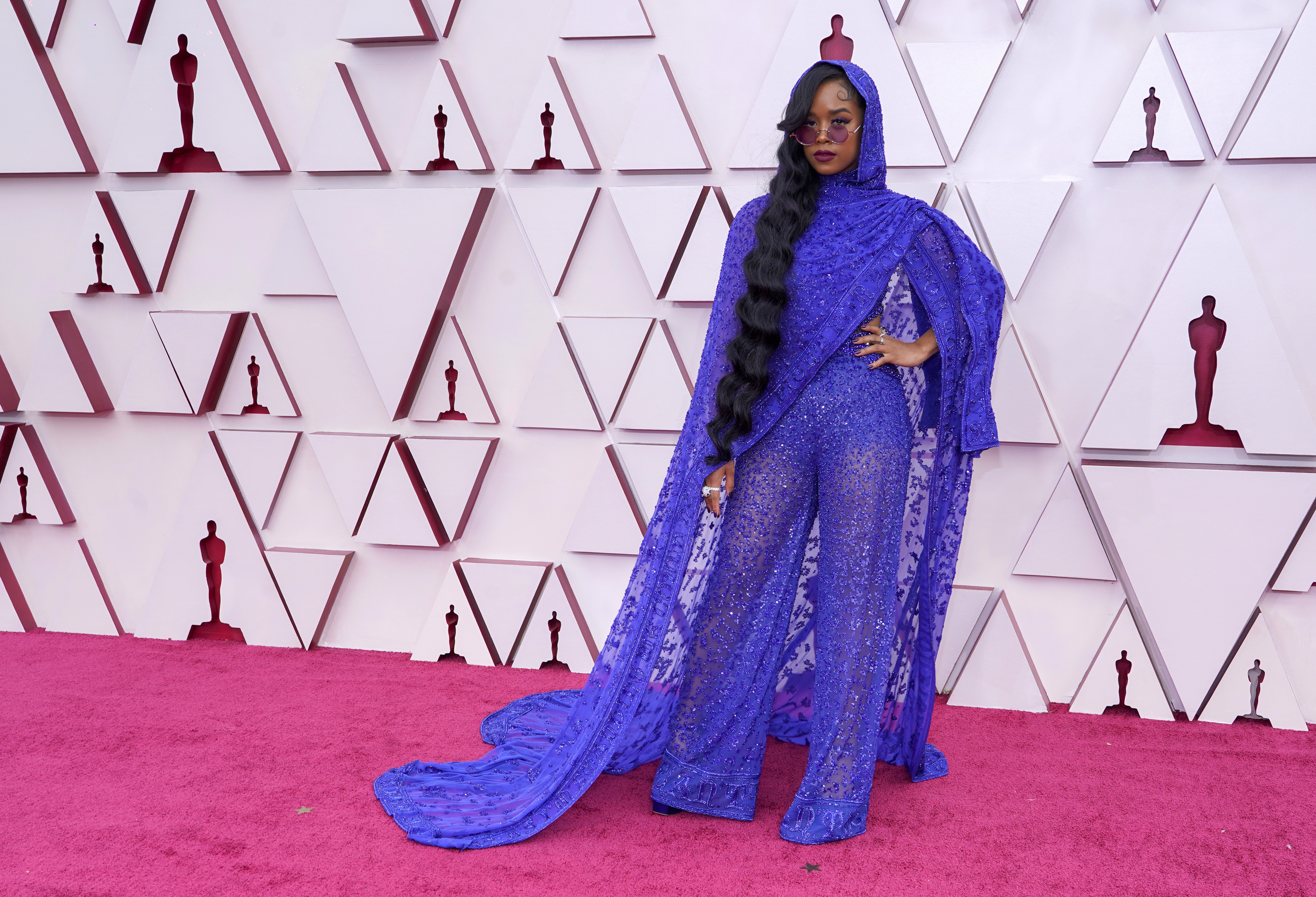 Singer H.E.R. walks the red carpet. She won her first Oscar Sunday night for her song "Fight for You" from "Judas and the Black Messiah."