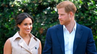 FILE - In this Oct. 2, 2019 file photo, Britain's Harry and Meghan, Duchess of Sussex arrive at the Creative Industries and Business Reception at the British High Commissioner's residence, in Johannesburg, South Africa.