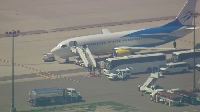 Plane carrying migrant girls