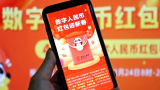 A digital Chinese currency red packet is seen on a mobile phone in an arranged photograph as Chengdu city starts to distribute 200,000 E-CNY ‘red packets’ worth 40 million yuan on February 24, 2021 in Yichang, Hubei Province of China.