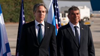 Secretary of State Antony Blinken, left, stands with Israeli Foreign Minister Gabi Ashkenazi, upon arrival at Tel Aviv Ben Gurion Airport, Tuesday, May 25, 2021, in Tel Aviv, Israel. Blinken has arrived in Israel at the start of a Middle East tour aimed at shoring up the Gaza cease-fire.