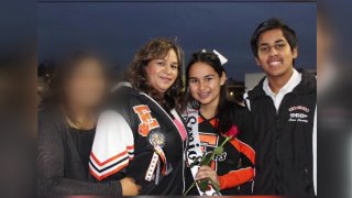 Left to right: 16-year-old daughter, mother Carmen Hernandez, daughter Catherine Hernandez, son Alberto Suarez.