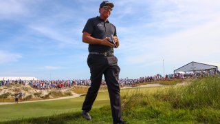 Phil Mickelson of the United States walks off the tenth tee during the third round of the 2021 PGA Championship at Kiawah Island Resort's Ocean Course.
