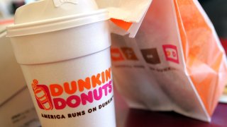 Dunkin' Donuts coffee and to-go bag.