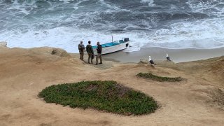 Authorities respond to one of a few scenes of a suspected human smuggling attempt off the waters of La Jolla on Thursday, May 20, 2021.