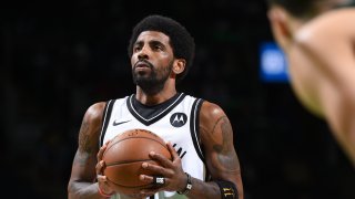 Kyrie Irving shoots the ball against the Boston Celtics during Round 1, Game 3 of the 2021 NBA Playoffs