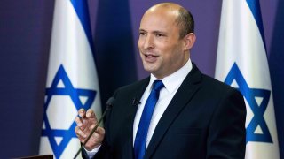 Yemina party leader Naftali Bennett speaks to the Israeli Parliament in Jerusalem, Sunday, May 30, 2021.