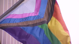 A Progress Pride Flag flies outside San Diego City Hall for the first time in honor of Pride Month.